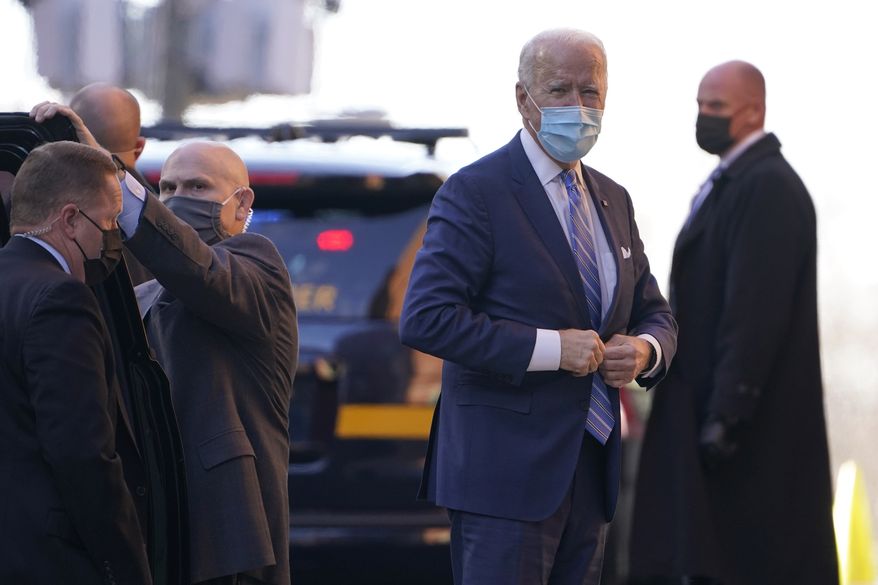 President-elect Joe Biden arrives at The Queen theater in Wilmington, Del., Monday, Dec. 7, 2020. (AP Photo/Susan Walsh)