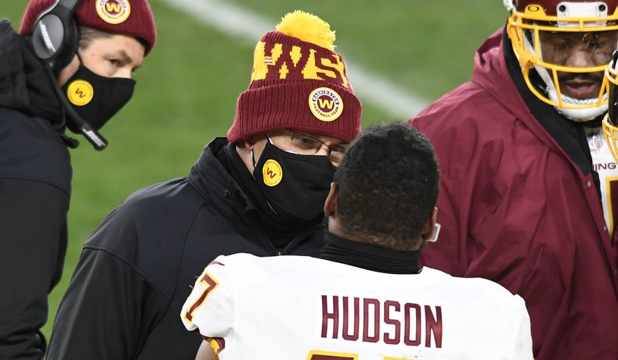 Washington Football Team head coach Ron Rivera talks with linebacker Khaleke Hudson (47) during the first half of an NFL football game against the Pittsburgh Steelers in Pittsburgh, Monday, Dec. 7, 2020. (AP Photo/Barry Reeger)  **FILE**