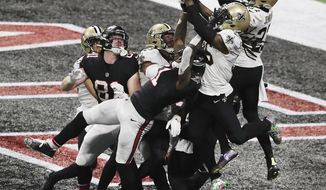 A pass to Atlanta Falcons wide receiver Julio Jones falls incomplete in the end zone as time expires with the New Orleans Saints defending in an NFL football game Sunday, Dec. 6, 2020, in Atlanta. (Curtis Compton/Atlanta Journal-Constitution via AP)