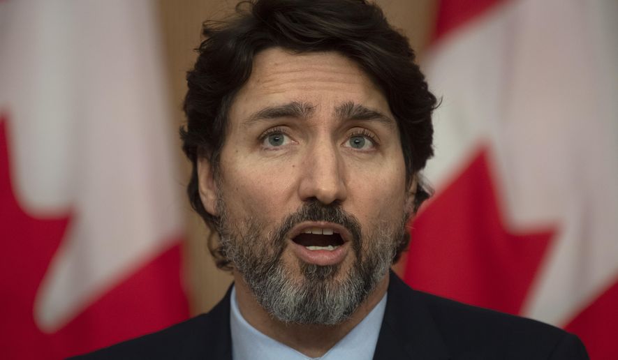 Prime Minister Justin Trudeau speaks at a news conference in Ottawa, Monday, Dec. 7, 2020. (Adrian Wyld/The Canadian Press via AP)