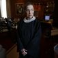FILE - In this July 24, 2013, file photo, Associate Justice Ruth Bader Ginsburg poses for a photo in her chambers at the Supreme Court in Washington, before an interview with The Associated Press. Ginsburg, 87, developed a cultlike following over her more than 27 years on the bench, especially among young women who appreciated her lifelong, fierce defense of women&#39;s rights. She died Sept. 18, 2020. (AP Photo/Charles Dharapak, File)