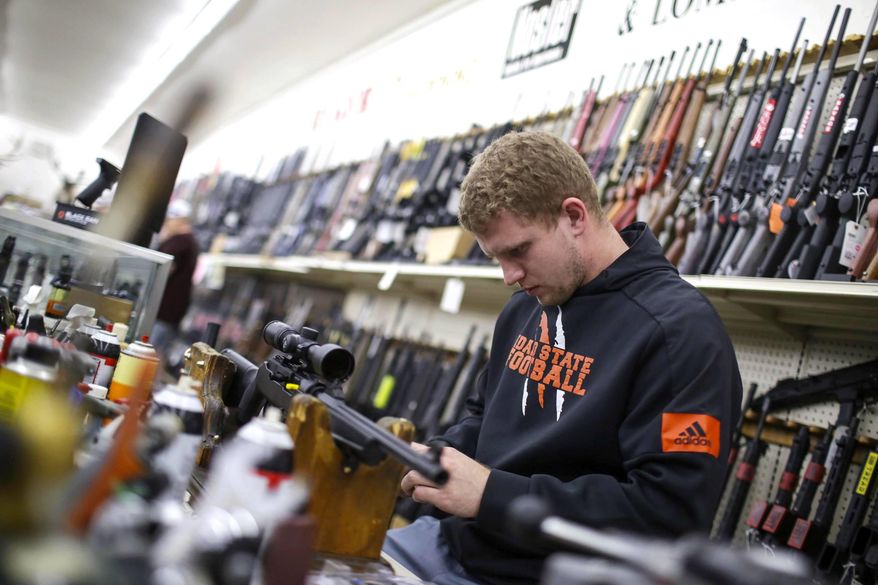 Just as grocery stores have been rushed by Americans panicked by coronavirus, guns and ammunition continue to fly off the shelves too. (Associated Press)