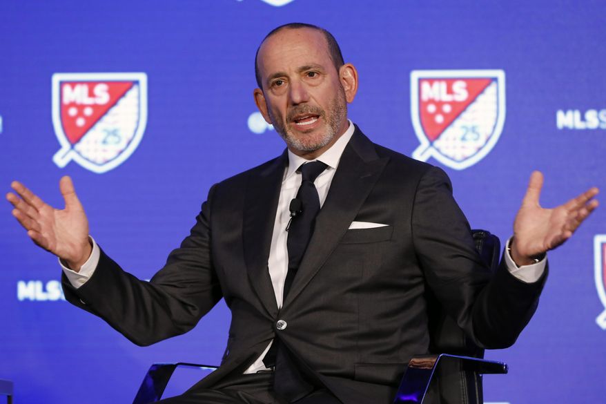 FILE - In this Feb. 26, 2020, file photo, Major League Soccer Commissioner Don Garber speaks during the leagues 25th Season kickoff event in New York. Garber said while Major League Soccer is on track to have losses nearing $1 billion because of the coronavirus, he&#39;s proud of how the league was able to navigate the pandemic and complete a difficult season. Garber gave his annual state of the league address on Tuesday, Dec. 8, 2020, in advance of the MLS Cup final on Saturday between the Seattle Sounders and Columbus Crew.(AP Photo/Richard Drew, File)
