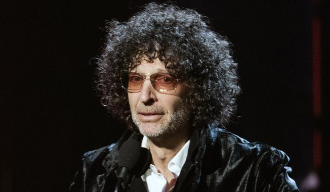 In this April 14, 2018, file photo, Howard Stern speaks at the 2018 Rock and Roll Hall of Fame Induction Ceremonies in Cleveland. Stern has reached a five-year deal with SiriusXM to continue making his show for the satellite radio company through the end of 2025, in a deal announced Tuesday, Dec. 8, 2020. Terms were not disclosed. Forbes magazine has reported that Stern was already making $90 million a year. (Photo by Michael Zorn/Invision/AP, File)