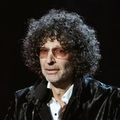 In this April 14, 2018, file photo, Howard Stern speaks at the 2018 Rock and Roll Hall of Fame Induction Ceremonies in Cleveland. Stern has reached a five-year deal with SiriusXM to continue making his show for the satellite radio company through the end of 2025, in a deal announced Tuesday, Dec. 8, 2020. Terms were not disclosed. Forbes magazine has reported that Stern was already making $90 million a year. (Photo by Michael Zorn/Invision/AP, File)