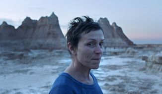 This image released by Searchlight Pictures shows Frances McDormand in a scene from the film &amp;quot;Nomadland&amp;quot; by Chloe Zhao. McDormand stars as a woman living rootlessly across the American West after the Great Recession. (Searchlight Pictures via AP)