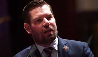 Rep. Eric Swalwell, California Democrat, argues with administration and intelligence officials who call China the greatest threat facing the U.S. (Associated Press/File)