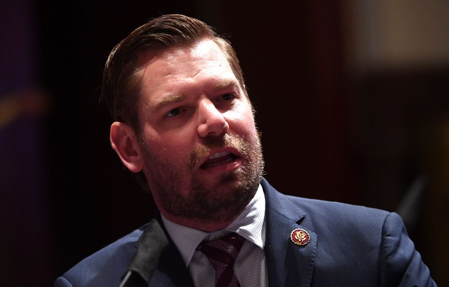 Rep. Eric Swalwell, California Democrat, argues with administration and intelligence officials who call China the greatest threat facing the U.S. (Associated Press/File)
