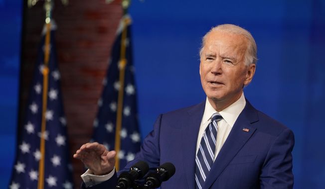 President-elect Joe Biden speaks during an event to announce his choice of retired Army Gen. Lloyd Austin to be secretary of defense, at The Queen theater in Wilmington, Del., Wednesday, Dec. 9, 2020. (AP Photo/Susan Walsh)