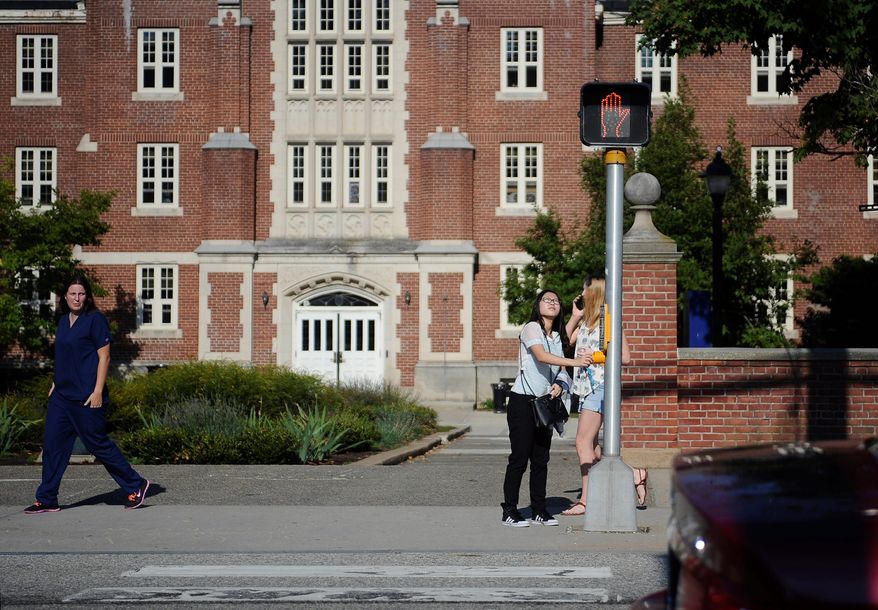 A national survey reports a 21.7% decline in college applications from high school seniors from one year ago. (Associated Press)