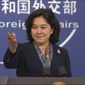 China&#39;s Foreign Ministry spokesperson Hua Chunying gestures during a press conference held at the Foreign Ministry in Beijing on Thursday, Dec. 10, 2020. China is imposing restrictions on travel to Hong Kong by some U.S. officials and others in retaliation for similar measures imposed on Chinese individuals by Washington, the Foreign Ministry said Thursday. (AP Photo/Liu Zheng)