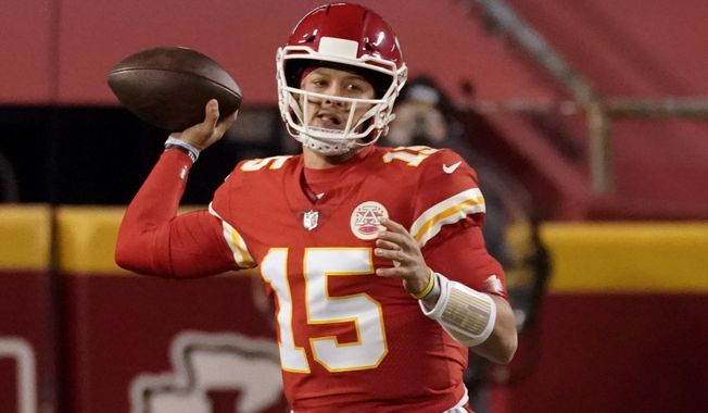 Kansas City Chiefs quarterback Patrick Mahomes thows against the Denver Broncos in the first half of an NFL football game in Kansas City, Mo., Sunday, Dec. 6, 2020. (AP Photo/Charlie Riedel )