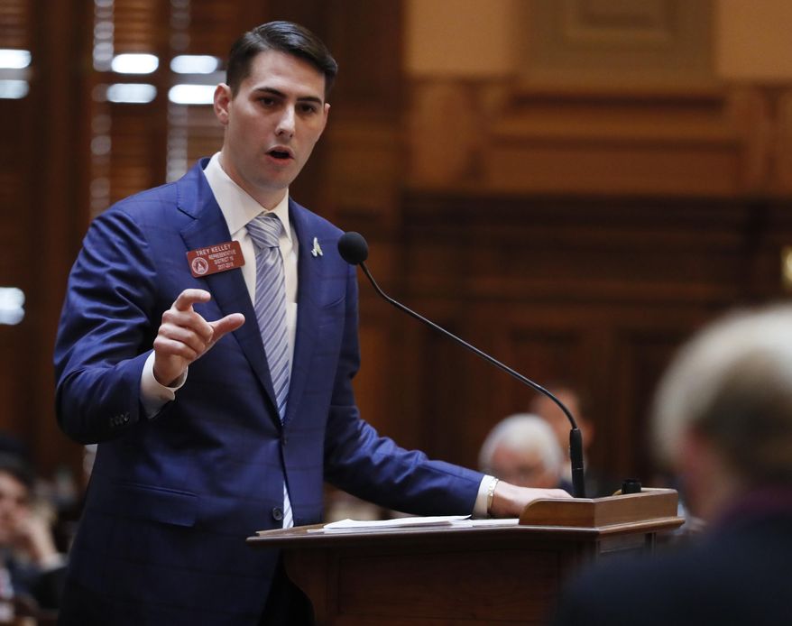 FILE - In this Thursday, March 29, 2018, file photo, Rep. Trey Kelley, R - Cedartown, presents HB 696, related to tax exemptions for computer equipment, which passed the 40th and final day of the 2018 General Assembly session in Atlanta. Kelley was indicted, Thursday, Dec. 10, 2020 on a misdemeanor charge of reckless conduct alleging he failed to call the proper help for a cyclist fatally injured by a friend. The Cedartown Republican, a high-ranking member of the House Republican leadership, denies wrongdoing. (Bob Andres/Atlanta Journal-Constitution via AP, File)