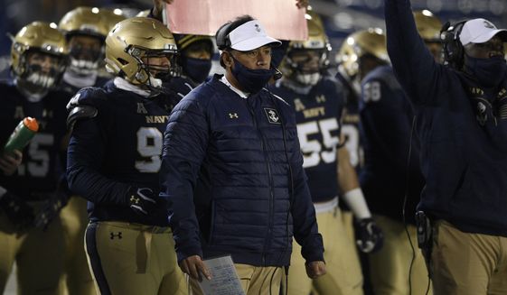 Navy head coach Ken Niumatalolo watches from the sidelines during the first half of an NCAA college football game against Tulsa, Saturday, Dec. 5, 2020, in Annapolis, Md. (AP Photo/Nick Wass)  **FILE **
