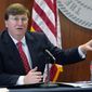 Mississippi Gov. Tate Reeves responds to questions regarding the holiday social receptions his office planned at the Governor&#39;s Mansion, during his covid news briefing, Wednesday, Dec. 9, 2020 in Jackson, Miss. (AP Photo/Rogelio V. Solis)