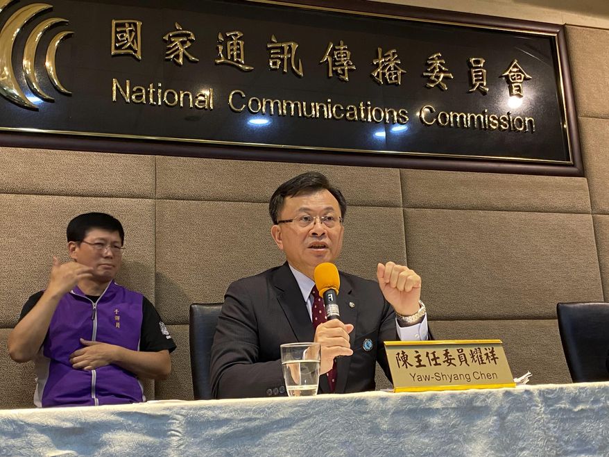 FILE - In this Nov. 18, 2020, file photo, Taiwan's National Communications Commission (NCC) chairman Chen Yaw-shyang makes remarks during a press conference explaining the rejection of the license renewal for the pro-China news channel CTi TV in Taipei, Taiwan. CTi TV prepared to halt its broadcast operations at midnight Friday, Dec. 11, 2020, after Taiwan’s government refused to renew its license, citing accuracy issues. (AP Photo/Johnson Lai, File)