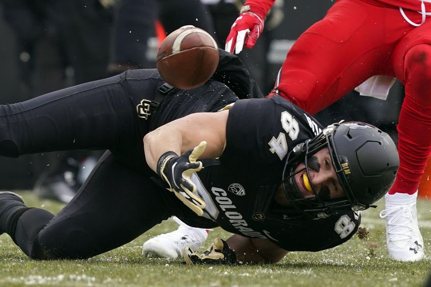 Colorado tight end Matt Lynch misses a pass against Utah in the first half of an NCAA college football game Saturday, Dec. 12, 2020, in Boulder, Colo. (AP Photo/David Zalubowski)