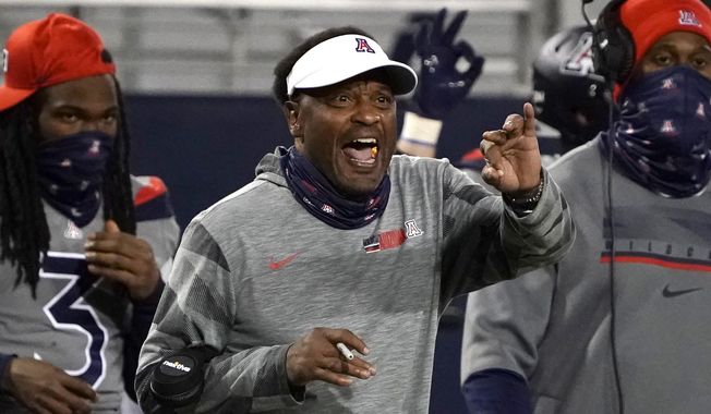 In this Saturday, Dec. 5, 2020, file photo, Arizona head coach Kevin Sumlin reacts to a call in the second half of an NCAA college football game against Colorado,, in Tucson, Ariz. Sumlin was fired Saturday, Dec. 12, 2020, less than 24 hours after a 70-7 loss to Arizona State that stretched the Wildcats&#x27; losing streak to 12 games spanning two seasons.   (AP Photo/Rick Scuteri, File) **FILE**