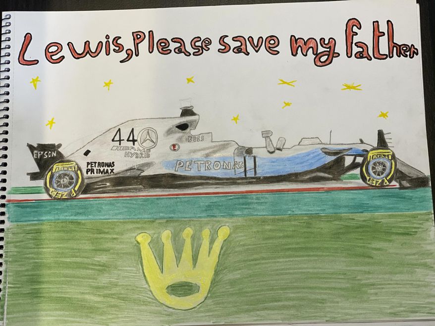 CORRECTS NAME This undated photo supplied by Sayed ahmed Alwadaei, Director of the Bahrain Institute for Rights and Democracy (BIRD), shows a drawing by Ahmed, of Formula One champion Lewis Hamilton's racing car, with his appeal for help in saving his father from execution. The 11-year old Ahmed is son of a Bahraini man on death row and at risk of imminent execution in Bahrain. BIRD has received letters from alleged torture victims in Bahrain, with pleas for seven-time F1 champion Hamilton to help political prisoners in Bahrain. (Photo by mother of Ahmed/BIRD via AP)
