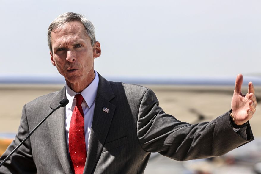 U.S. Rep. Dan Lipinski speaks to a gathering of elected officials and airport staff on June 6, 2019, during a news conference announcing the construction of a new air traffic control tower at Lewis University Airport, in Romeoville, Ill. Lipinski had represented the 3rd District in Congress since 2005, but he lost his bid for reelection in March 2020 after losing to Marie Newman in the Democratic primary. (Eric Ginnard/The Herald-News via AP) **FILE**