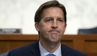 In this Oct. 14, 2020, photo Sen. Ben Sasse, R-Neb., questions Supreme Court nominee Amy Coney Barrett during the third day of her confirmation hearings before the Senate Judiciary Committee on Capitol Hill in Washington. (Stefani Reynolds/Pool via AP) **FILE**