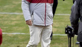 Alabama coach Nick Saban heads off the field following Alabama&#39;s 52-3 win over Arkansas in an NCAA college football game Saturday, Dec. 12, 2020, in Fayetteville, Ark. (AP Photo/Michael Woods)