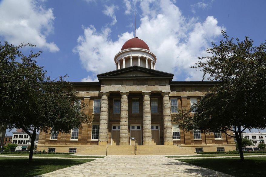 FILE - In this Aug. 21, 2013 file photo, The Illinois Old State Capitol is seen, in Springfield, Ill. It was 50 years ago that Illinois voters approved a state constitution that was forward-looking and made government more efficient. Given recent headlines, it's hard to imagine characterizing Illinois government as efficient or forward-looking. (AP Photo/Seth Perlman File)
