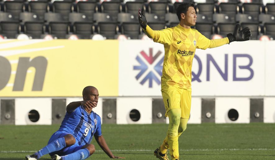 Ulsan Hyundai's Júnior Negrão, left, reacts as he claims a penalty after a challenge during the Champions League semifinal soccer match between Vissel Kobe and Ulsan Hyundai FC at Jassim Bin Hamad Stadium in Doha, Qatar, Sunday, Dec. 13, 2020. (AP Photo/Hussein Sayed)