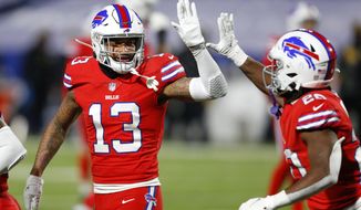 Buffalo Bills wide receiver Gabriel Davis (13) celebrates after taking a pass from Josh Allen for a touchdown during the second half of an NFL football game against the Pittsburgh Steelers in Orchard Park, N.Y., Sunday, Dec. 13, 2020. (AP Photo/Jeffrey T. Barnes )