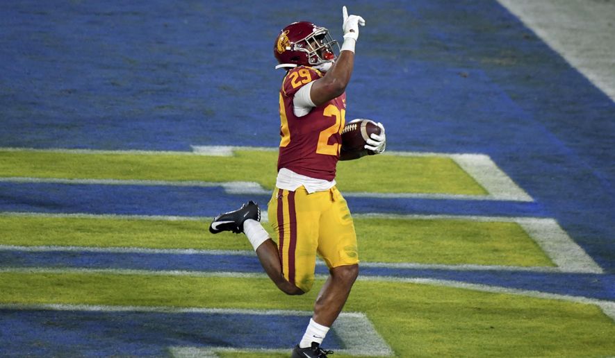 Southern California running back Vavae Malepeai celebrates a touchdown against UCLA during the second half of an NCAA college football game Saturday, Dec. 12, 2020, in Pasadena, Calif. (Keith Birmingham/The Orange County Register via AP)