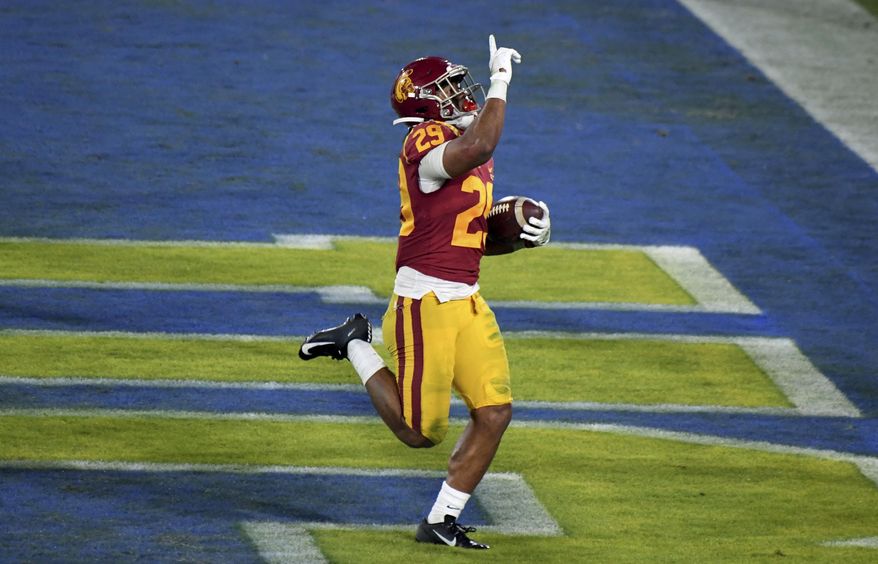 Southern California running back Vavae Malepeai celebrates a touchdown against UCLA during the second half of an NCAA college football game Saturday, Dec. 12, 2020, in Pasadena, Calif. (Keith Birmingham/The Orange County Register via AP)