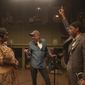 This image released by Netflix shows Viola Davis as Ma Rainey, left, director George C. Wolfe, center, and Chadwick Boseman as Levee during the filming of &amp;quot;Ma Rainey&#39;s Black Bottom.&amp;quot; (David Lee/Netflix via AP)