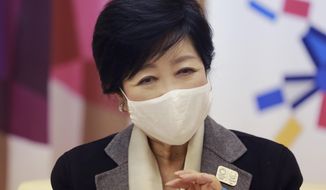 Tokyo Gov. Yuriko Koike speaks during an interview with The Associated Press in Tokyo, Monday, Dec. 14, 2020. The growing availability of coronavirus vaccines is a “ray of hope” for hosting the Olympics next summer, Koike said Monday as Japan struggles with a new surge in infections. (AP Photo/Koji Sasahara)