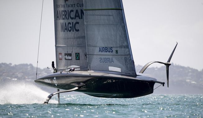 American Magic, the U.S. entry for the America&#x27;s Cup yachting regatta practices on the harbor in Auckland, New Zealand, on Monday, Dec. 14, 2020. American Magic is one of three challengers from the United States, Italy and Britain which will emerge to race defender Team New Zealand for the America&#x27;s Cup in the 36th regatta in March. (Dean Purcell/New Zealand Herald via AP)