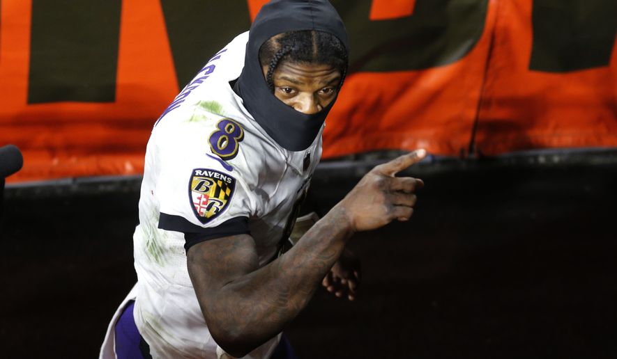 Baltimore Ravens quarterback Lamar Jackson looks up as he leaves the field after an NFL football game against the Cleveland Browns, Monday, Dec. 14, 2020, in Cleveland. The Ravens won 47-42. (AP Photo/Ron Schwane)