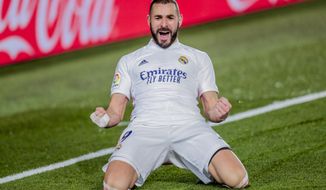 Real Madrid&#39;s Karim Benzema celebrates after scoring his side&#39;s second goal during the Spanish La Liga soccer match between Real Madrid and Athletic Club Bilbao at the Alfredo Di Stefano stadium in Madrid, Spain, Tuesday, Dec. 15, 2020. (AP Photo/Bernat Armangue)