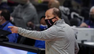 New York Knicks coach Tom Thibodeau gestures during the second half of the team&#39;s preseason NBA basketball game against the Detroit Pistons, Friday, Dec. 11, 2020, in Detroit. (AP Photo/Carlos Osorio)
