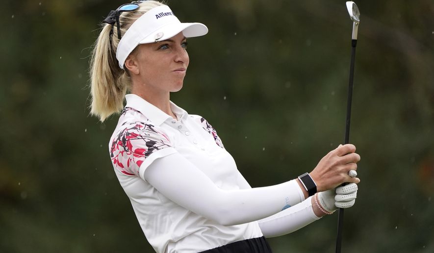 Sophia Popov, of Germany watches her drive off the 16th tee during the second round of the U.S. Women's Open golf tournament in Houston, Friday, Dec. 11, 2020. (AP Photo/Eric Gay)