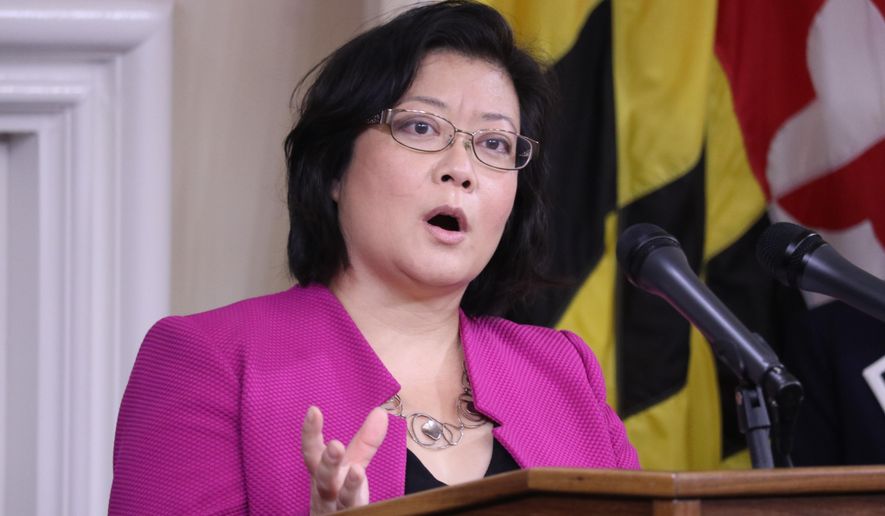 FILE - In this Thursday, Nov. 12, 2020 file photo, Dr. Jinlene Chan, Maryland's deputy health secretary, speaks during a news conference about battling the coronavirus pandemic in Annapolis, Md. All Maryland hospitals are expected to receive some COVID-19 vaccine in the next two weeks to begin vaccinating critical frontline staff, a state health official said Tuesday, Dec. 15, 2020. Dr. Jinlene Chan, Maryland’s acting deputy health secretary, said nursing homes also will begin vaccinations within the next two weeks. (AP Photo/Brian Witte, File)
