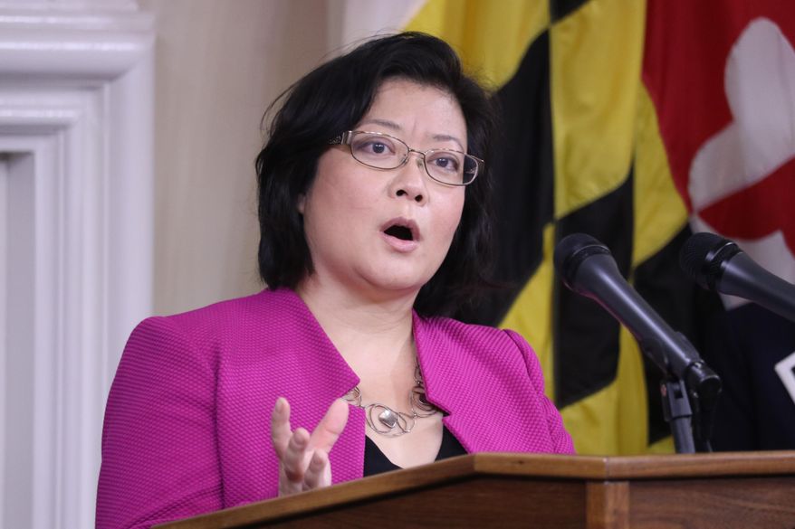 FILE - In this Thursday, Nov. 12, 2020 file photo, Dr. Jinlene Chan, Maryland's deputy health secretary, speaks during a news conference about battling the coronavirus pandemic in Annapolis, Md. All Maryland hospitals are expected to receive some COVID-19 vaccine in the next two weeks to begin vaccinating critical frontline staff, a state health official said Tuesday, Dec. 15, 2020. Dr. Jinlene Chan, Maryland’s acting deputy health secretary, said nursing homes also will begin vaccinations within the next two weeks. (AP Photo/Brian Witte, File)