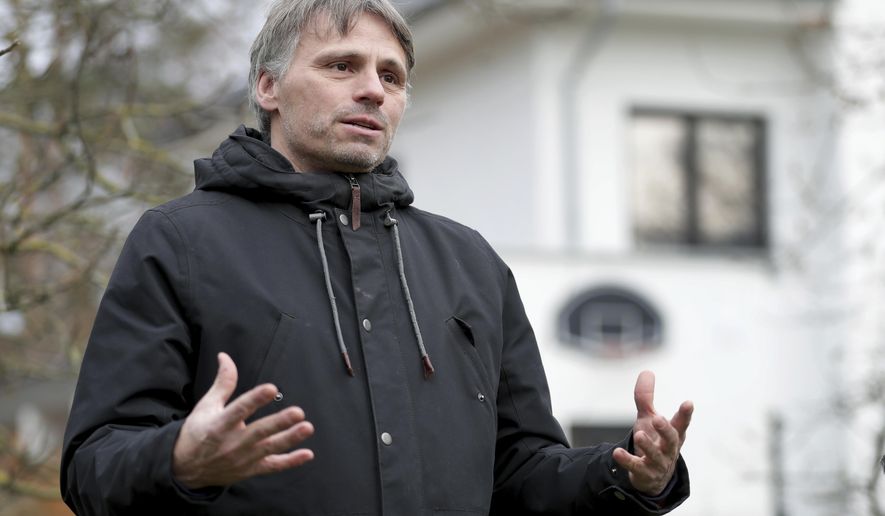 Fabian Leendertz, a biologist who specialized in emerging diseases at the Robert Koch Institute, speaks during an interview with the Associated Press in Falkensee, near Berlin, Germany, Tuesday, Dec. 15, 2020. (AP Photo/Michael Sohn)