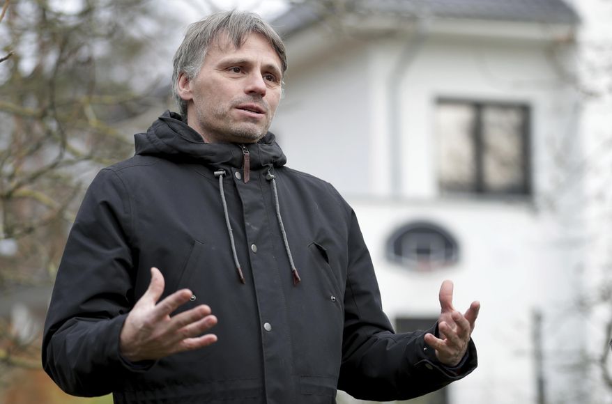 Fabian Leendertz, a biologist who specialized in emerging diseases at the Robert Koch Institute, speaks during an interview with the Associated Press in Falkensee, near Berlin, Germany, Tuesday, Dec. 15, 2020. (AP Photo/Michael Sohn)