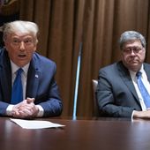 In this Sept. 23, 2020, file photo, then-Attorney General William P. Barr listens as President Donald Trump speaks during a meeting with Republican state attorneys general about social media companies, in the Cabinet Room of the White House in Washington. (AP Photo/Evan Vucci, File)