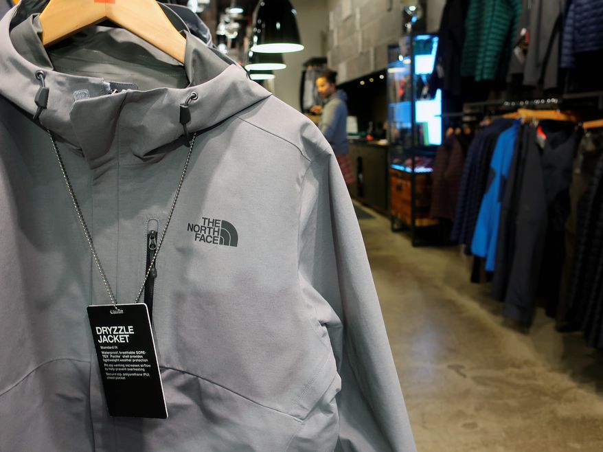 This Monday, Aug. 13, 2018, photo shows clothing for sale at The North Face store in New York. (AP Photo/Ted Shaffrey)