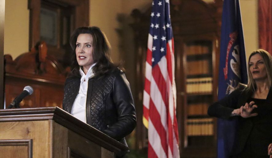In this Oct. 8, 2020, file photo provided by the Michigan Office of the Governor, Michigan Gov. Gretchen Whitmer addresses the state during a speech in Lansing, Mich. (Michigan Office of the Governor via AP, File)