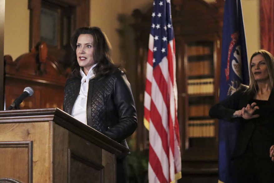 In this Oct. 8, 2020, file photo provided by the Michigan Office of the Governor, Michigan Gov. Gretchen Whitmer addresses the state during a speech in Lansing, Mich. (Michigan Office of the Governor via AP, File)