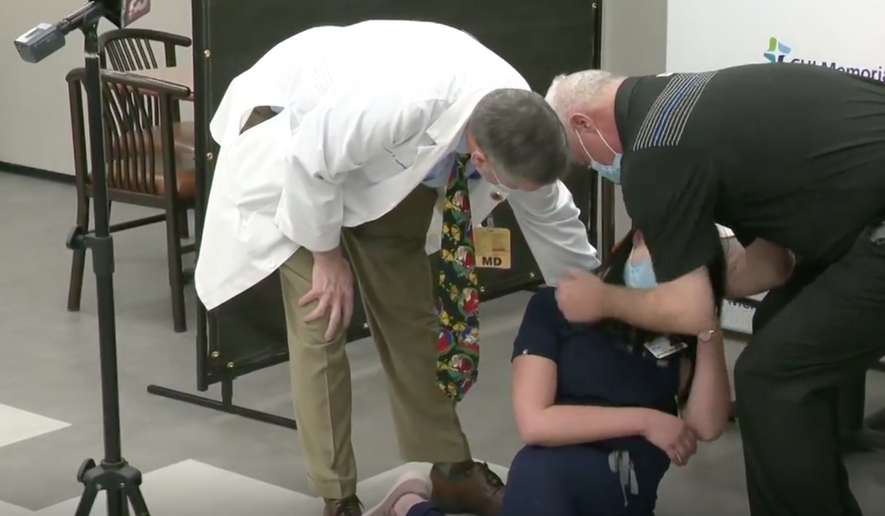 Nurse Manager Tiffany Dover had been speaking to the media about the city's first vaccinations of front-line health workers when she collapsed, according to video posted by WTVC-9, the Chattanooga ABC affiliate. (Screenshot from WTVC-9)