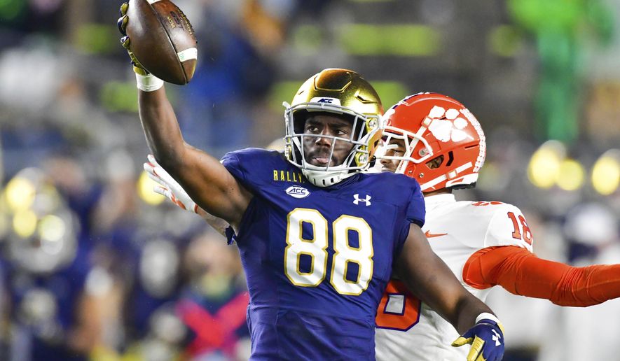 FILE - Notre Dame wide receiver Javon McKinley (88) reacts after a catch during the third quarter against Clemson in an NCAA college football game in South Bend, Ind., in this Saturday, Nov. 7, 2020, file photo. The Notre Dame Fighting Irish beat the Clemson Tigers in a thrilling 47-40 shootout earlier this season. The big question now is if they can do it again. (Matt Cashore/Pool Photo via AP, File)