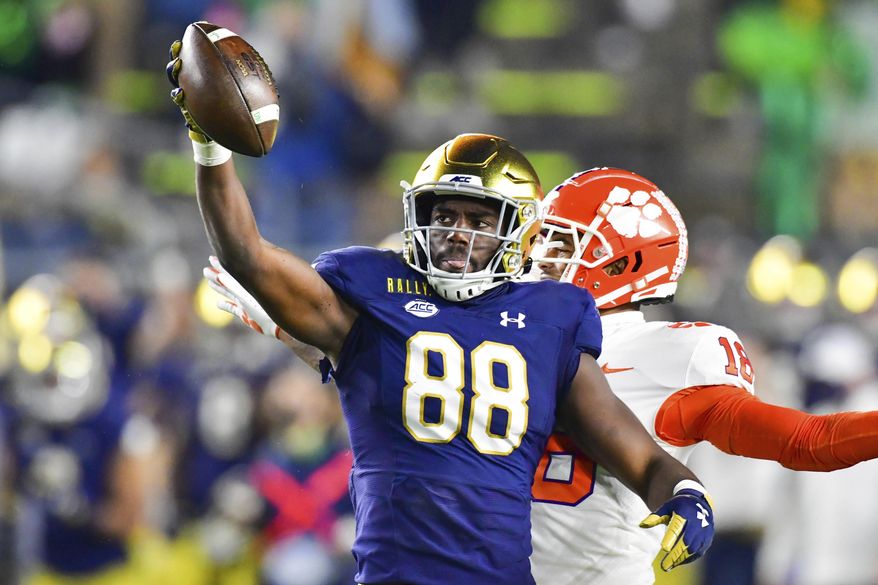 FILE - Notre Dame wide receiver Javon McKinley (88) reacts after a catch during the third quarter against Clemson in an NCAA college football game in South Bend, Ind., in this Saturday, Nov. 7, 2020, file photo. The Notre Dame Fighting Irish beat the Clemson Tigers in a thrilling 47-40 shootout earlier this season. The big question now is if they can do it again. (Matt Cashore/Pool Photo via AP, File)
