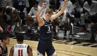 BYU forward Matt Haarms (3) celebrates after BYU defeated San Diego State in an NCAA college basketball game Friday, Dec. 18, 2020, in San Diego. (AP Photo/Denis Poroy)
